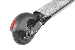 Rear solid tyre electric scooter. LED lights of the URBAN-BRLN V2 electric scooter. Safety feature of an electric scooter. Shop now from Electric Travels and find your cleaner way to travel https://electrictravels.co.uk/collections/the-urban/products/the-urban-brln-v2-scooter