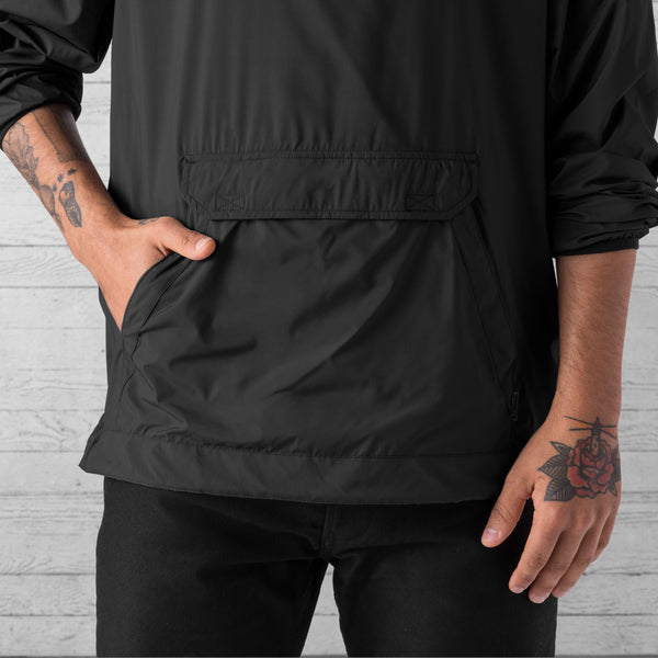 Black windproof chrome industries jacket made from 100% quick dry, moisture wicking material that performs well against light rainfall. This windbreaker jacket has a large front pocket to fit your essentials and keep them dry. Get yourself a jacket that folds down to be pocket sized to protect you from light rainfall, available at Electric Travels. https://electrictravels.co.uk